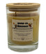 a candle in a glass jar