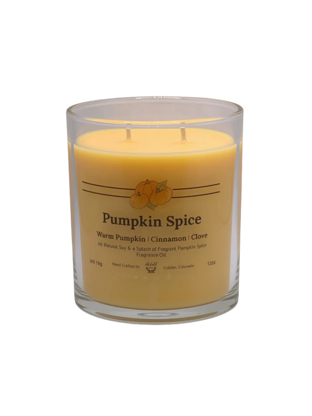 A two-wick candle in a clear glass jar with a label reading 'Pumpkin Spice' on a white background.